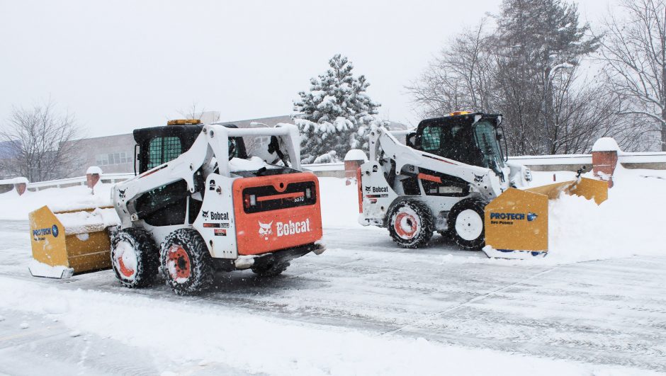 skidsteer with sno pushers