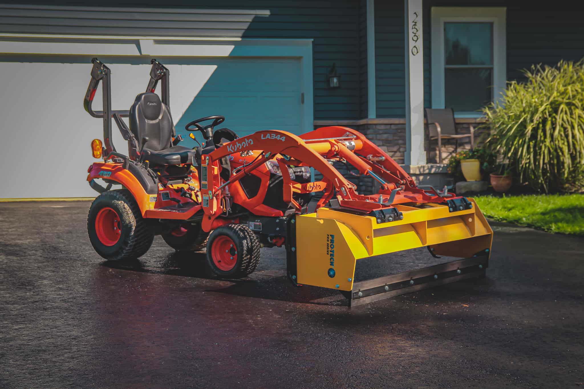 Kubota tractor snow pusher with back drag